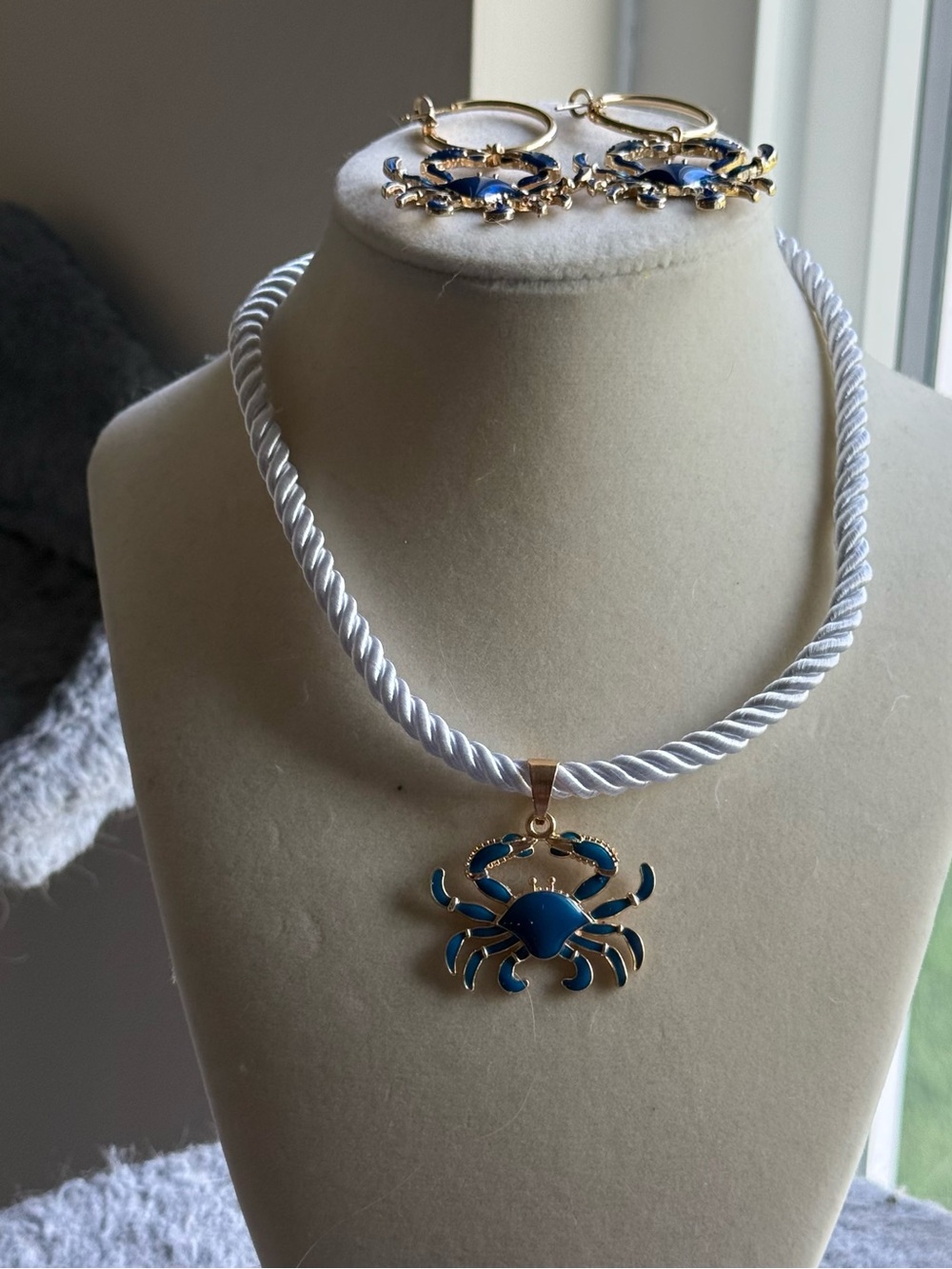 Gold-Tone Blue Enamel Crab Pendant Necklace on White Rope